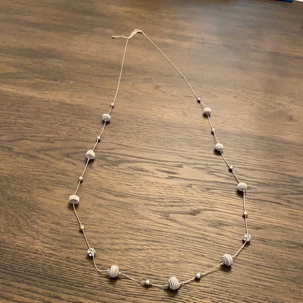 Silver ball adjustable necklace.